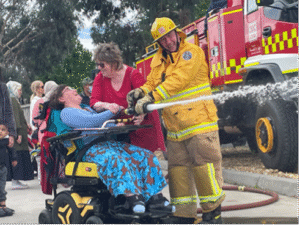 Tamara Achieved Her Dream of using a firemans hose with the Epping CFA